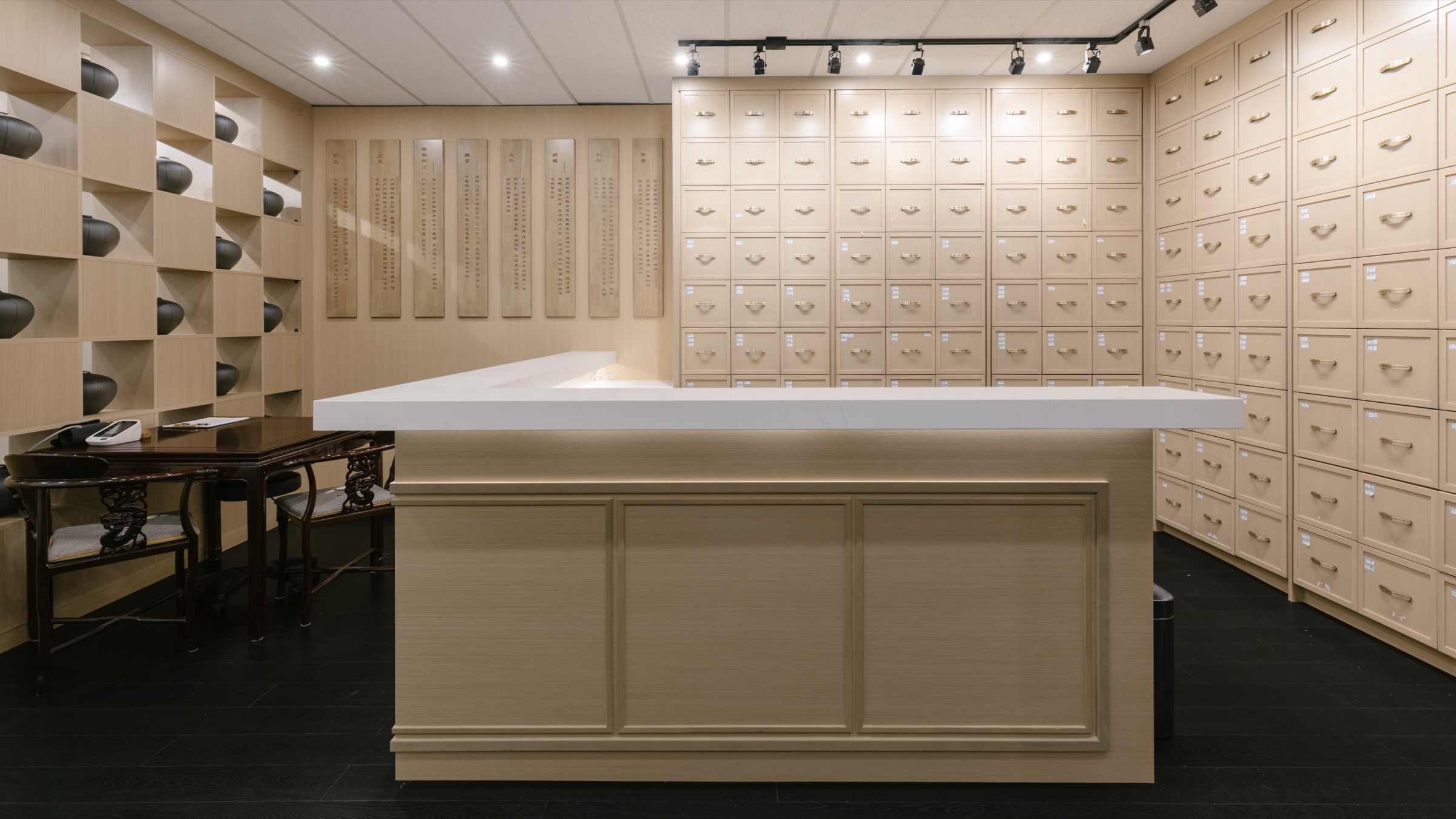 Traditional herbal medicine cabinet wall at Canadian Western TCM Richmond flagship clinic