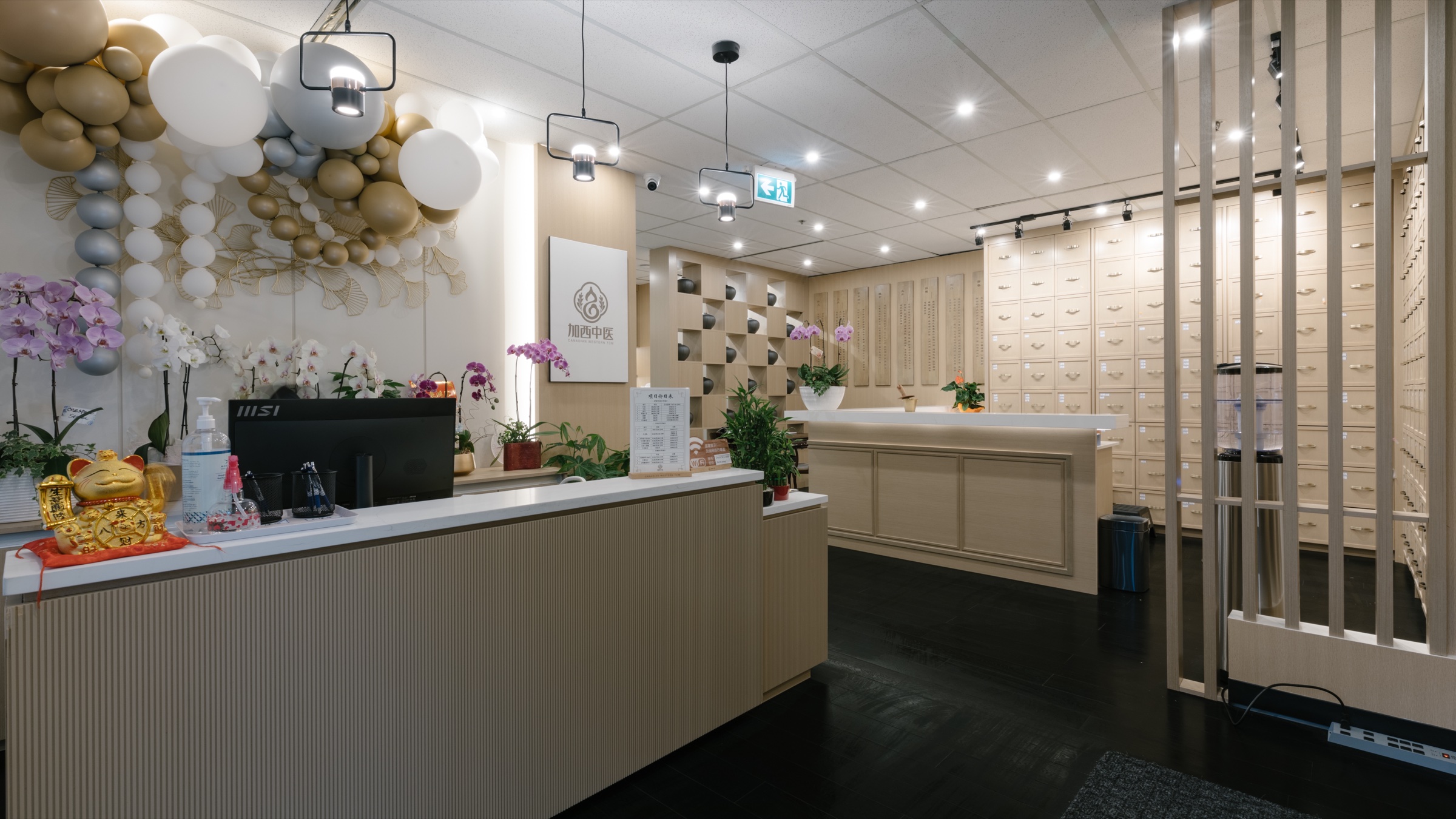 Reception and herbal cabinet at Canadian Western TCM Richmond clinic